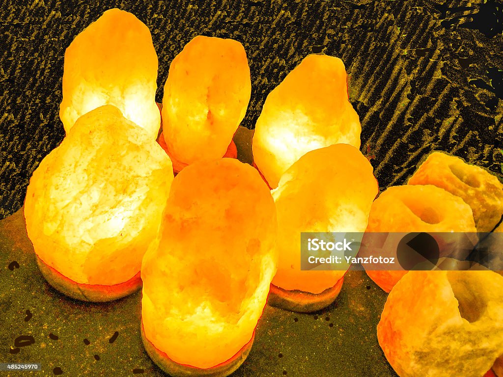 Himalayan Salt Lamp Air Purifier Generates Healthy Negative Ions Lamps at the right are ready to have the light bulb inserted to make them glow and give off negative ions 2015 Stock Photo