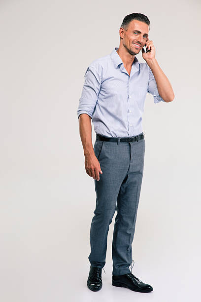 istock Smiling businessman talking on the phone 485246784