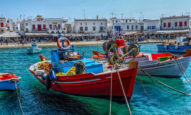 istock Mulicolored fishing boat in Mikonos harbour. 485249630