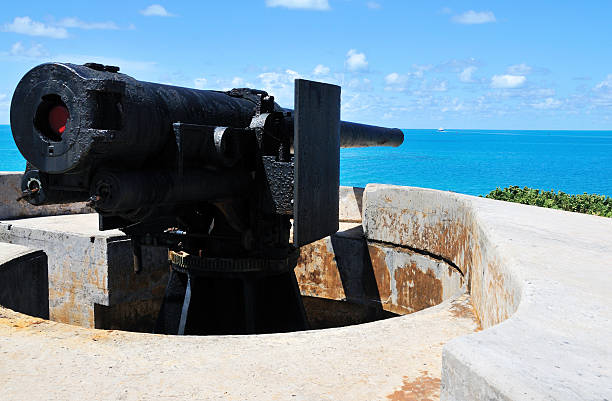 istock Cannon Pointing at the blue ocean 485256713