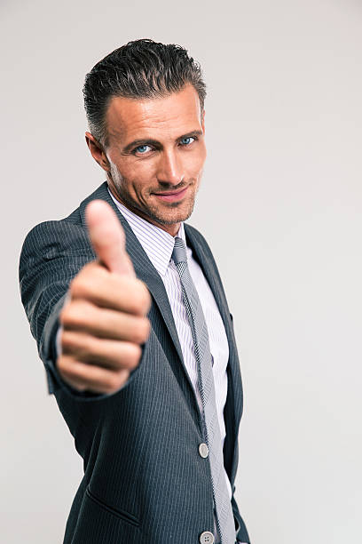 istock Handsome businessman showing thumb up 485257600