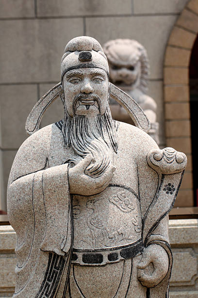 istock Statues of Chinese deity and lion sculpture. 485258461