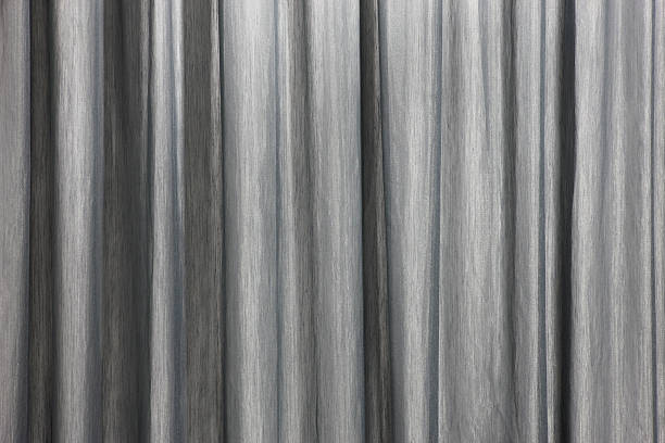 istock Curtain background detail with waves in black and white 485261774