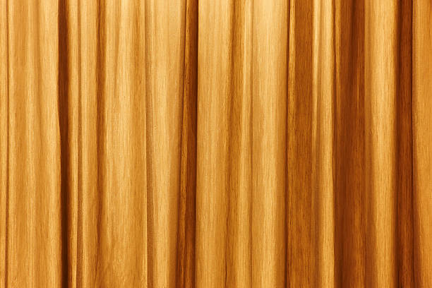 istock Curtain background detail with waves in warm tone 485262002