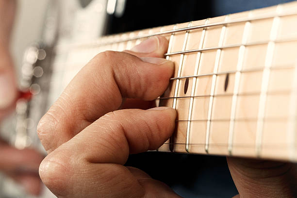 istock Hands of man playing electric guitar 485268738