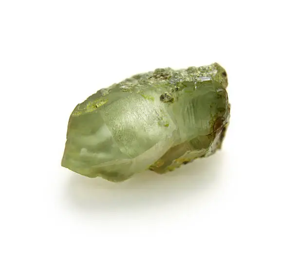 Green minerl isolated on white background. Fine sample for your mineralogical collection.