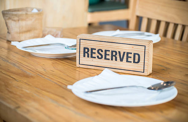 istock Reserved sign on a table in restaurant 485281748