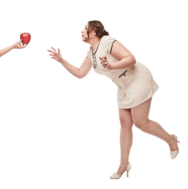 istock Beautiful plus size woman wish for apple 485289251