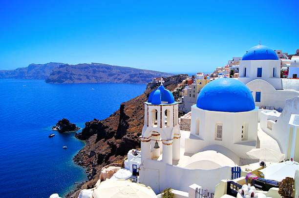 istock Santorini scene with famous blue dome churches, Greece 485289451