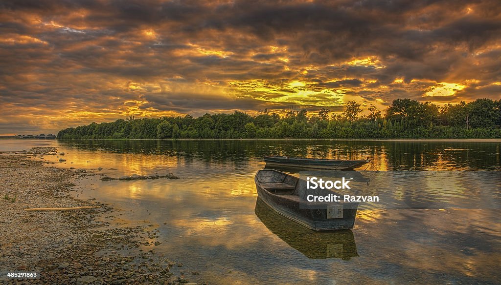 Sunset on the Loire River in France Beautiful sunset on the Loire River located in the Central France. Allong this river is the famous Loire Valley where are some of the most famous castles in the world.HDR image. Dawn Stock Photo