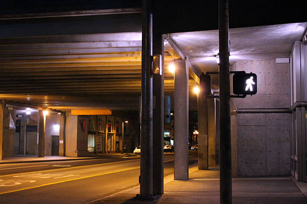 Could be almost any city, no logos not plants, just familiar concrete and street lights.  I love how much it says and how little at the same time.