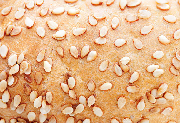 istock Texture of white bread with sesame seeds 485294799