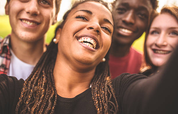 istock Group of college student laughing and doing a selfie 485295029