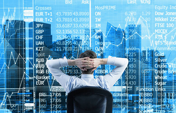 istock relaxing businessman is in a modern panoramic office in Singapore. 485299560