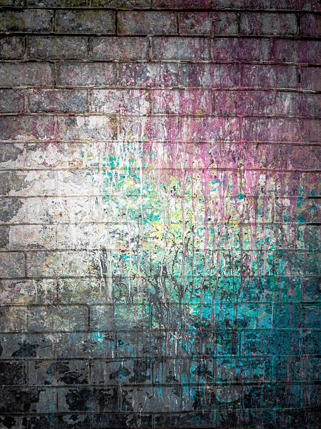 istock Dirty brick with spots of paint colors 485305428