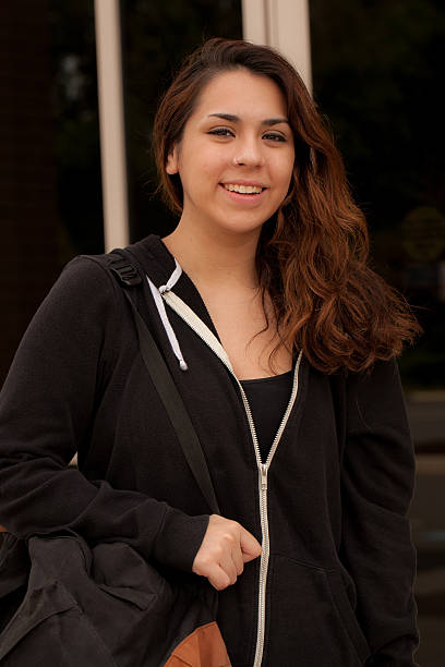 istock Happy Hispanic female college student 485305644