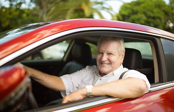 istock senior man in a car 485311880