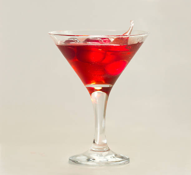 istock Drop of water falling in martini glass 485311997
