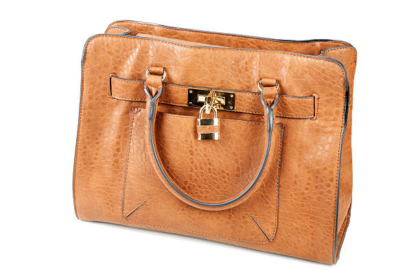istock brown female bags isolated on a white background 485312495