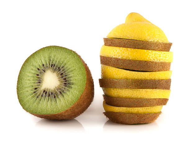 istock Isolated lemon and kiwi slices tower (half kiwi) 485313619