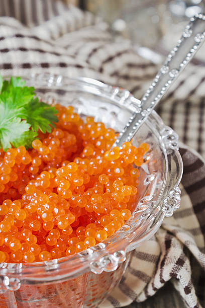 istock red caviar in a glass bowl on the table 485316221