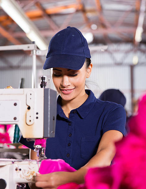 istock female factory worker sewing garment 485316424