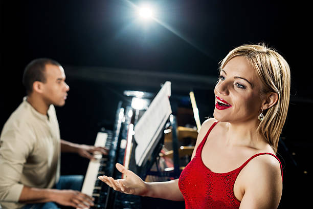 istock Female opera singer with a pianist. 485316705