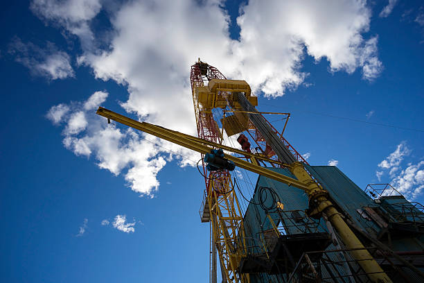 Oil birthplace. Oil well pumpjacks against the cloudy sky. Oil industry concept