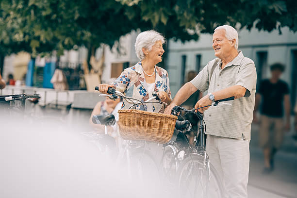 istock Seniors with Bycicles in the City 485317216
