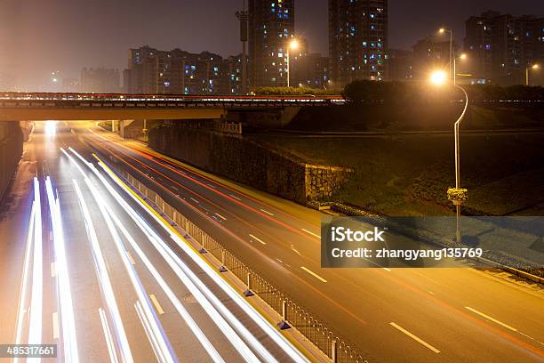 Foto de Estrada Vazia À Noite e mais fotos de stock de Autoestrada - Autoestrada, Cidade, Curva - Forma