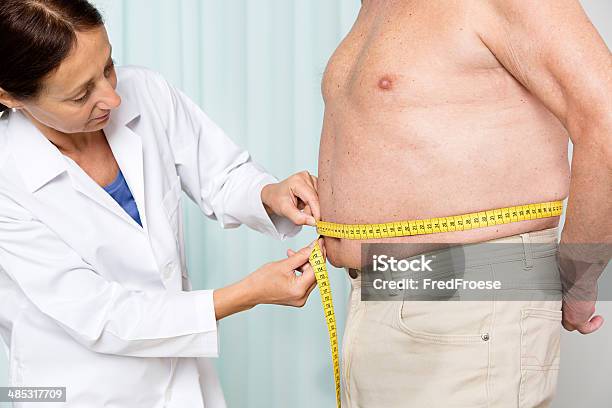 Overweight Senior Adult Stock Photo - Download Image Now - Measuring, 70-79 Years, Active Seniors