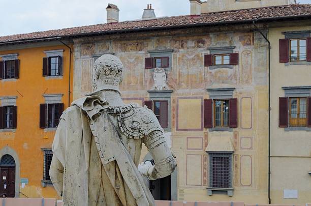 istock Pisa lungarno view with statue and colorful buildings 485321664