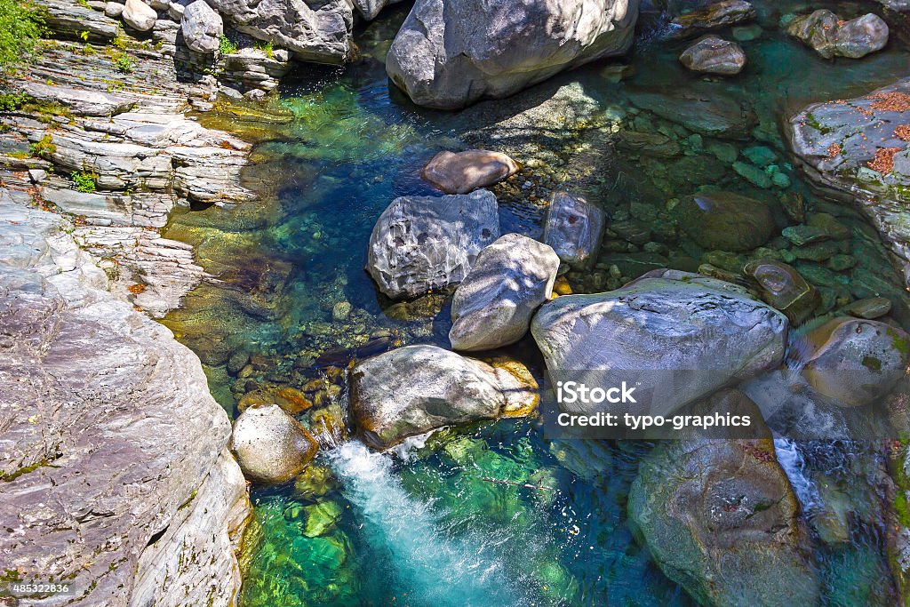 Maggia river flowing Maggia river flowing between rocks in Brontallo, Ticino Canton, Switzerland. 2015 Stock Photo