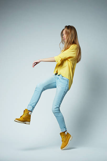 istock girl with long hair posing in studio 485323192
