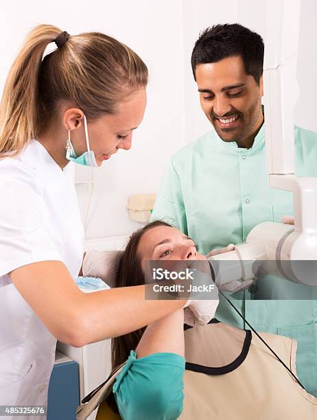 Portrait Of Doctor And Positive Patient Stock Photo - Download Image Now - 2015, 25-29 Years, Adult
