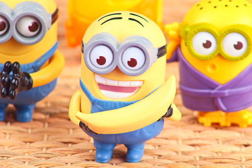 Cairo, Egypt - August 3, 2015: Minions toy an action figure from Despicable Me 2 animated 3D film produced by Illumination Entertainment for Universal Pictures.