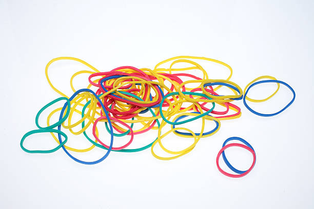 istock lot of colorful rubber bands over white 485328764