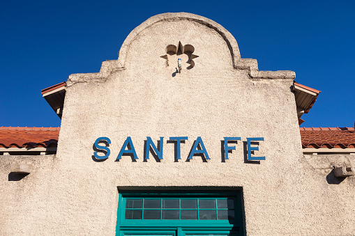 The Santa Fe, New Mexico train station on a sunny day.