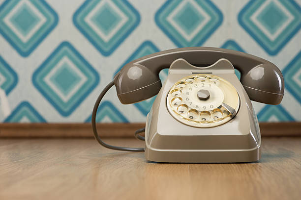istock Vintage telephone on diamond wallpaper 485333450