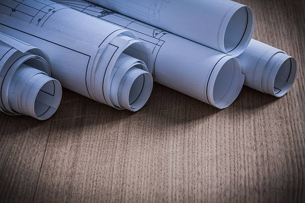 istock Close up view of construction plans architecture and building co 485334490