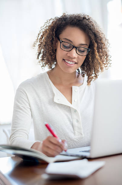 istock Woman studying at home 485336724