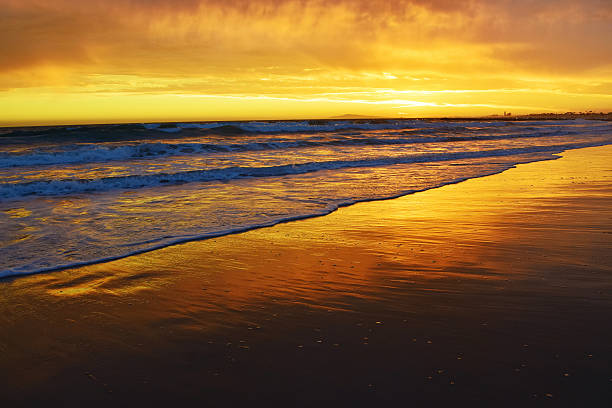 A beautiful summer sunset in Newport Beach, Southern California. Newport is a beach community in Orange County.