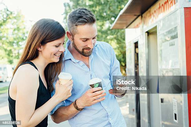 Young Happy Couple Look At Selfie Picture Prints Stock Photo - Download Image Now - 2015, 30-39 Years, Adult