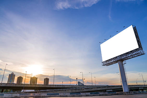 istock large blank billboard with city view and background 485338136