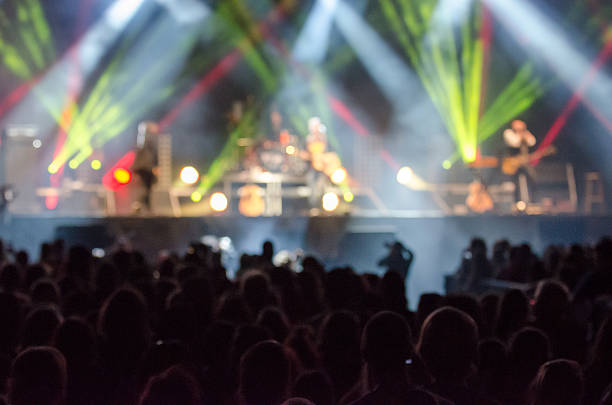 istock Front view of crowd at music concert 485340772