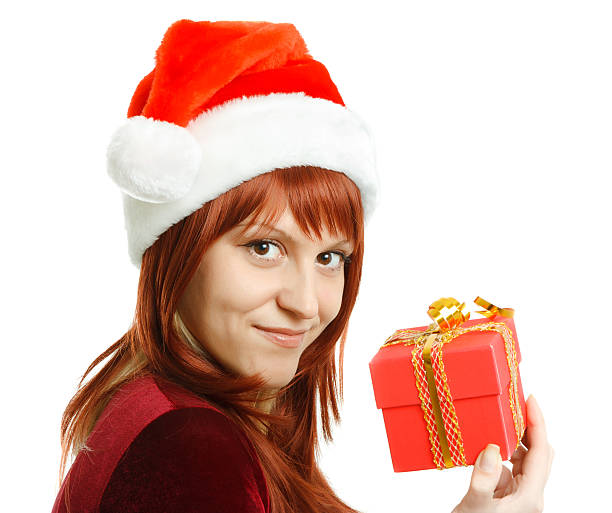 istock girl with Christmas present 485340925