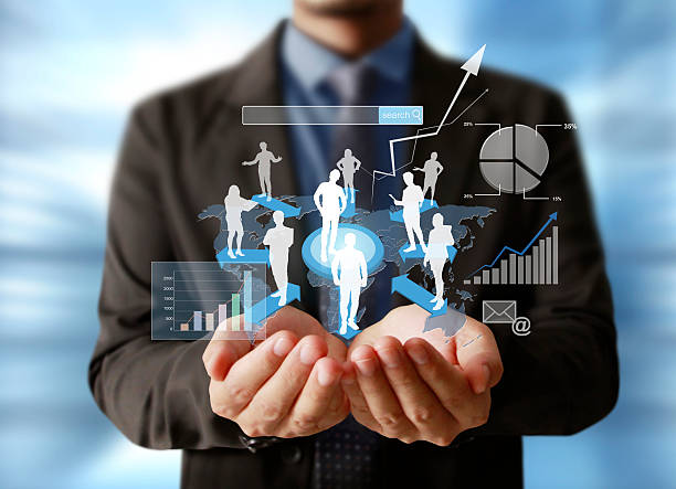 istock Businessman with financial symbols 485341840