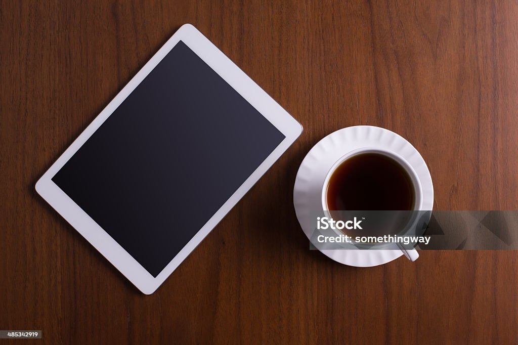 White screen digital tablet on business desk Blank Stock Photo