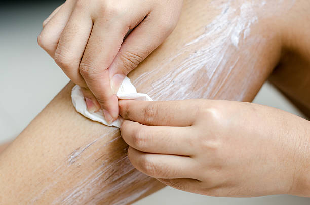 istock scrubs hair removal cream 485343725