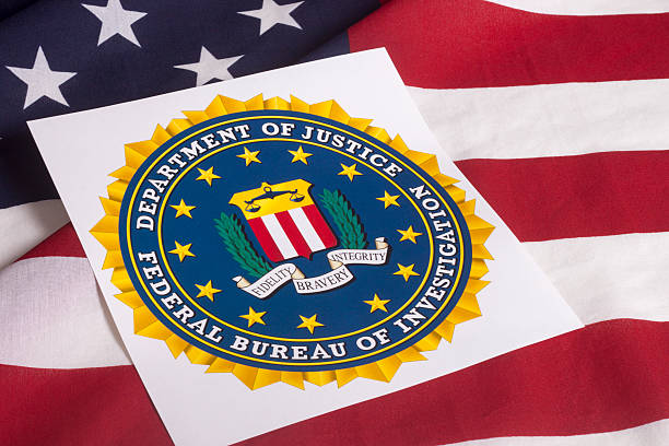 istock Department of justice with US flag 485344236